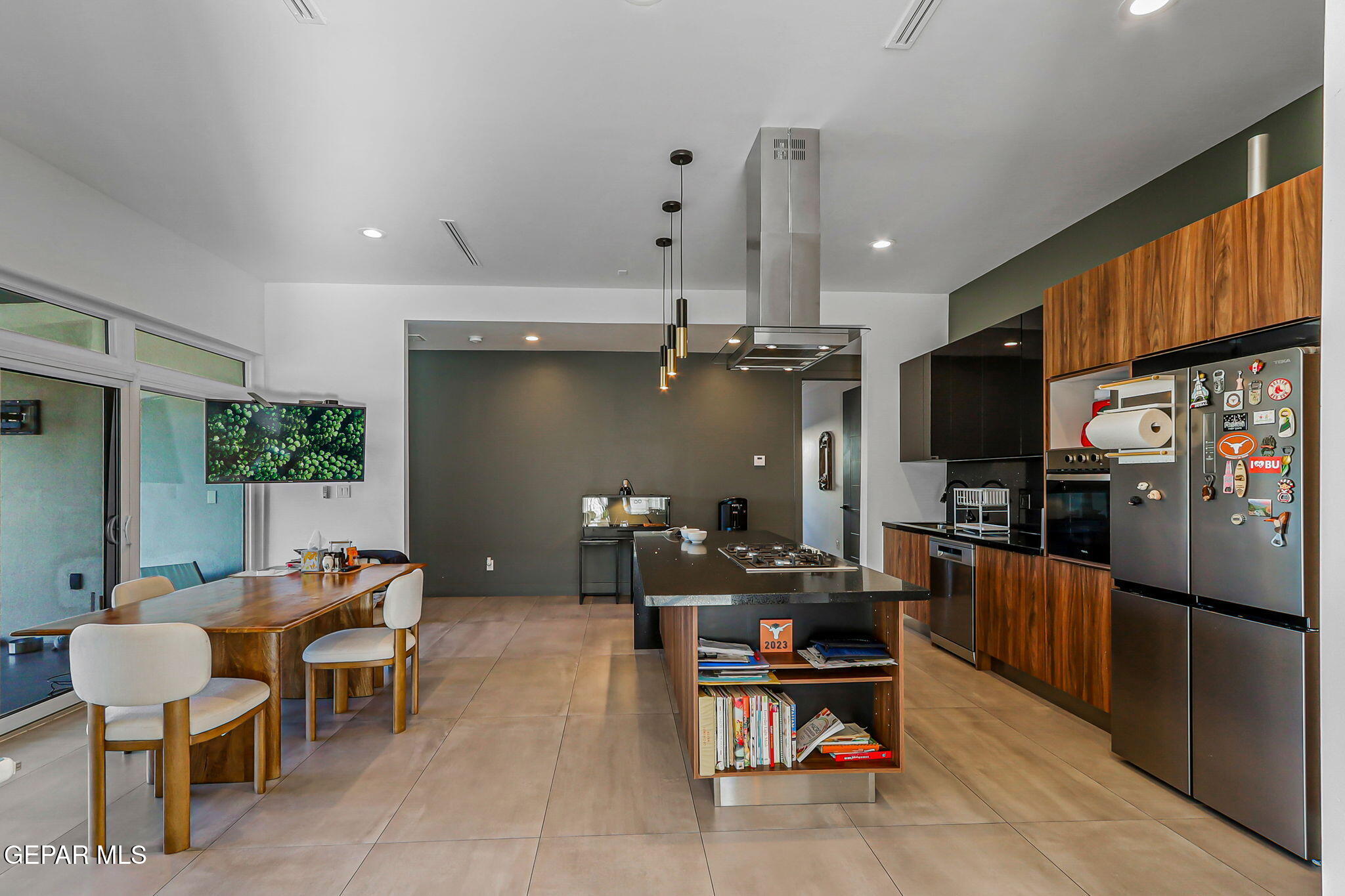 329 Rio Del Rancho Court El Paso, TX 79932 - Photo 18 of 52 a living room with furniture a large window and stainless steel appliances
