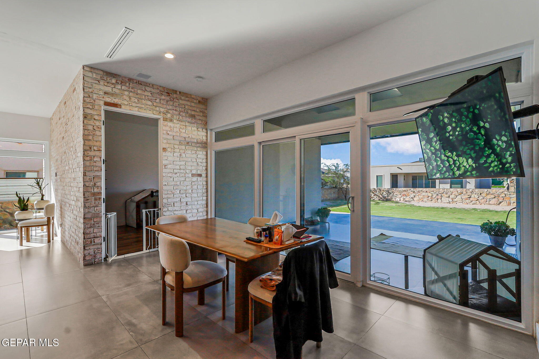 329 Rio Del Rancho Court El Paso, TX 79932 - Photo 20 of 52 a dining room with furniture window and outside view