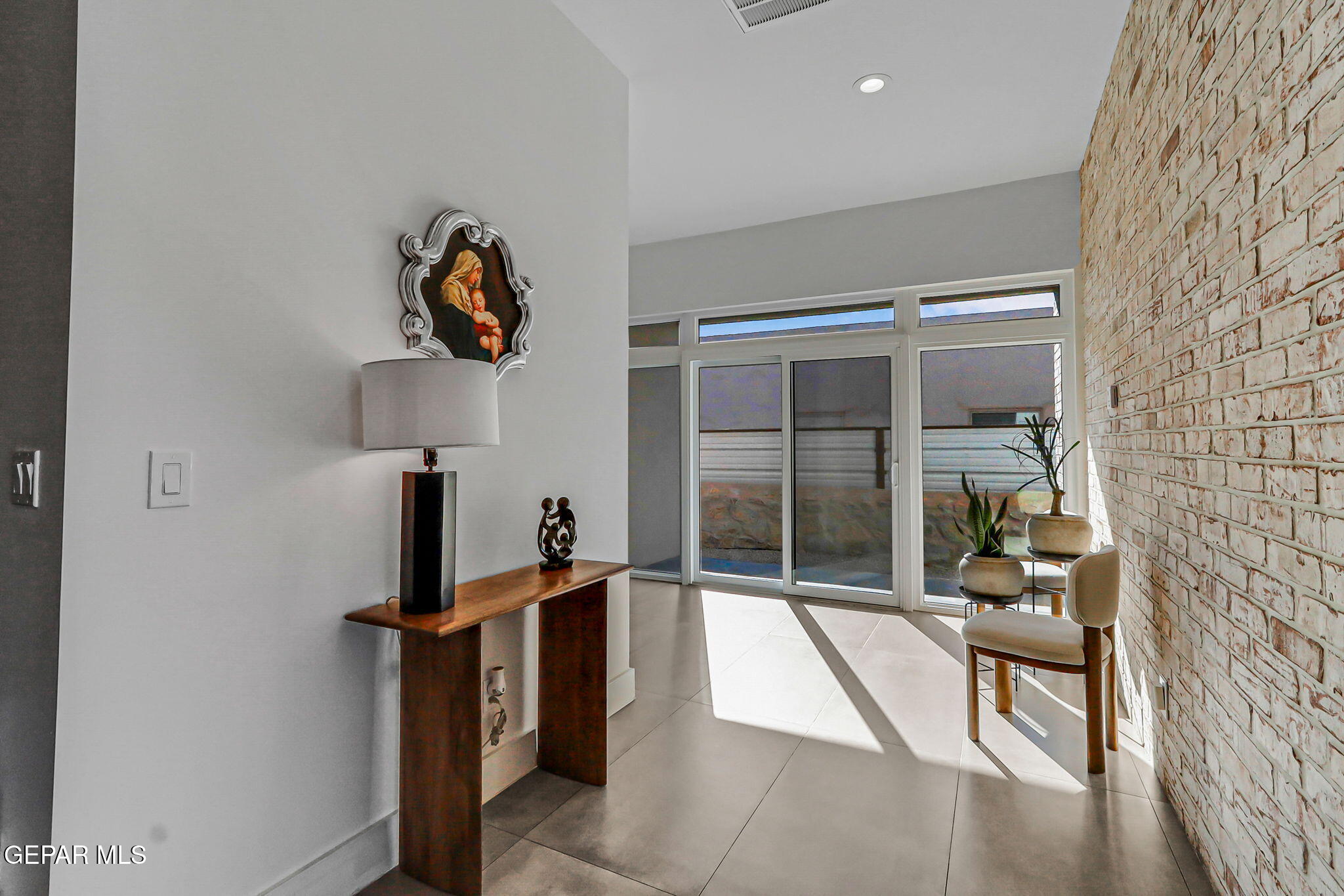 329 Rio Del Rancho Court El Paso, TX 79932 - Photo 21 of 52 a view of a hallway with seating area