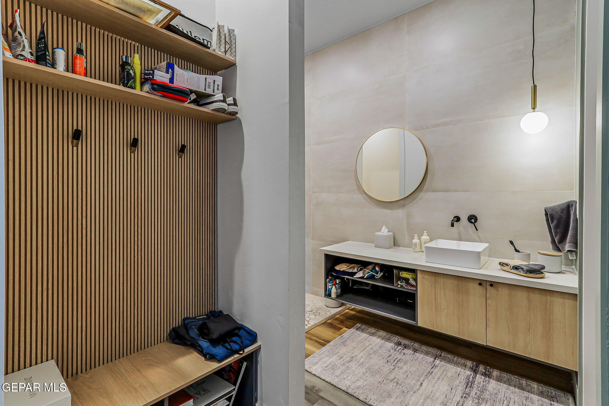 329 Rio Del Rancho Court El Paso, TX 79932 - Photo 26 of 52 a bathroom with a sink and a mirror