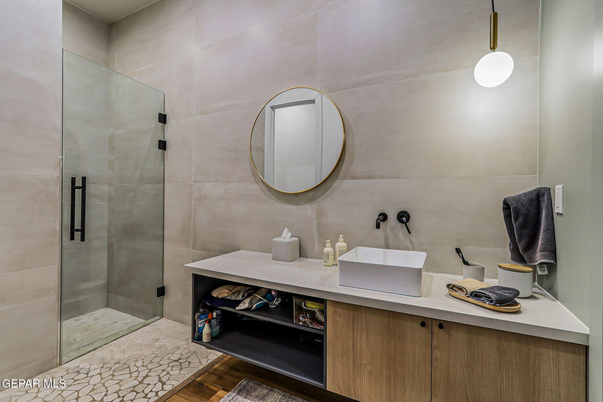 329 Rio Del Rancho Court El Paso, TX 79932 - Photo 27 of 52 a bathroom with a sink and a mirror