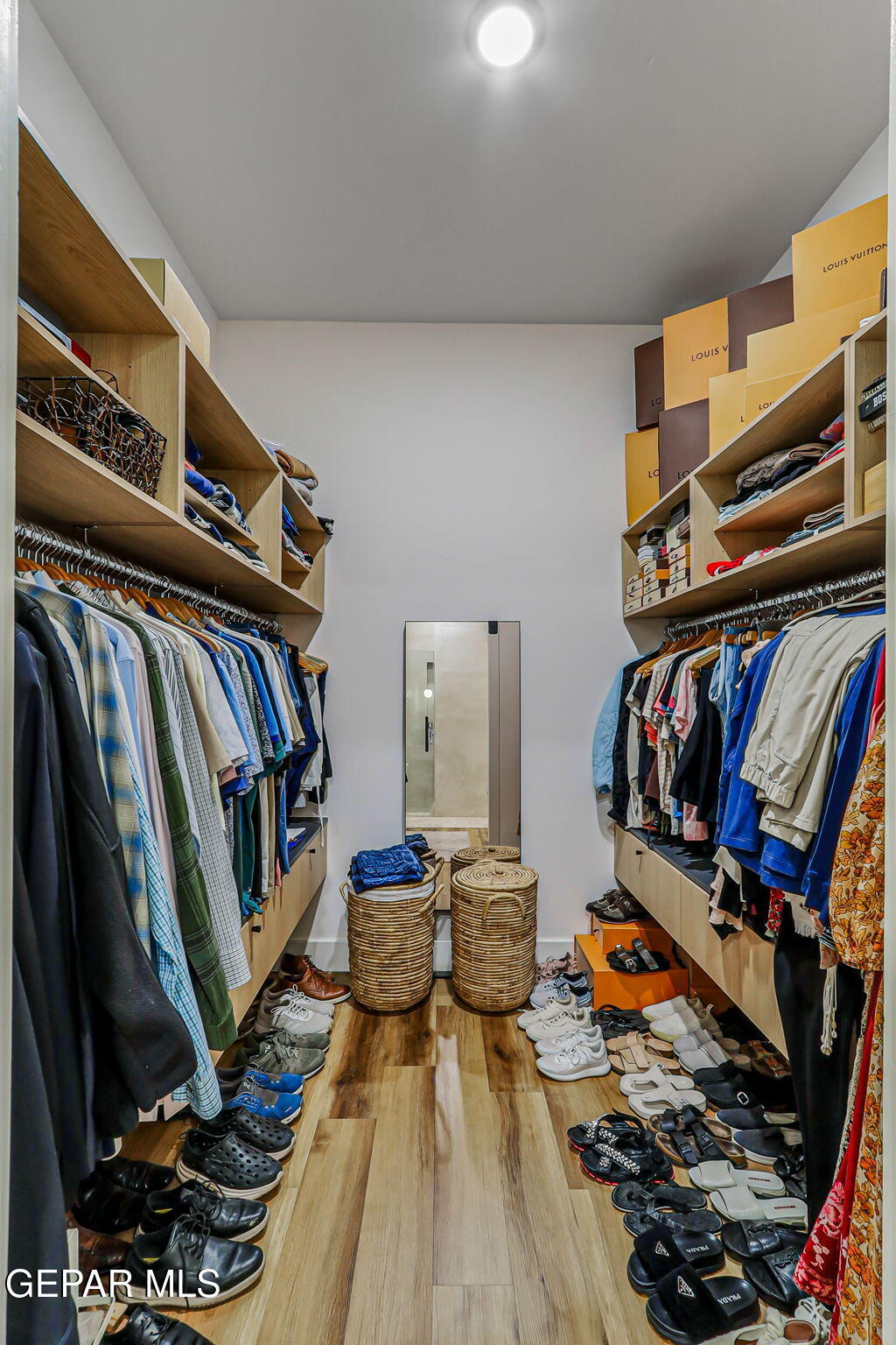 329 Rio Del Rancho Court El Paso, TX 79932 - Photo 28 of 52 a view of walk in closet with clothes and shoes
