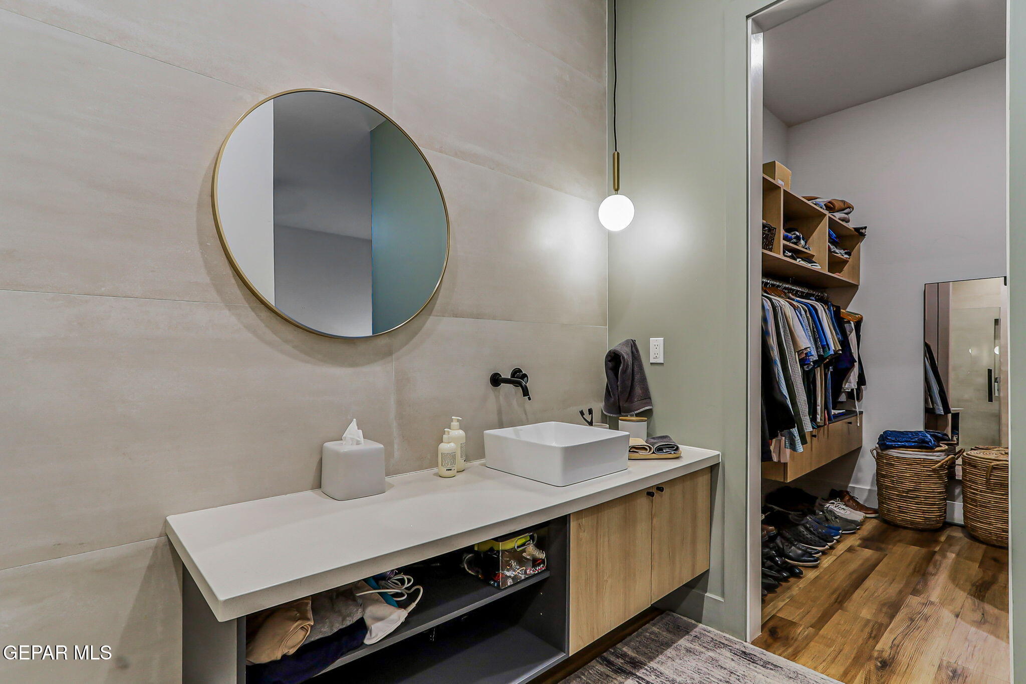 329 Rio Del Rancho Court El Paso, TX 79932 - Photo 29 of 52 a bathroom with a sink a vanity and a mirror