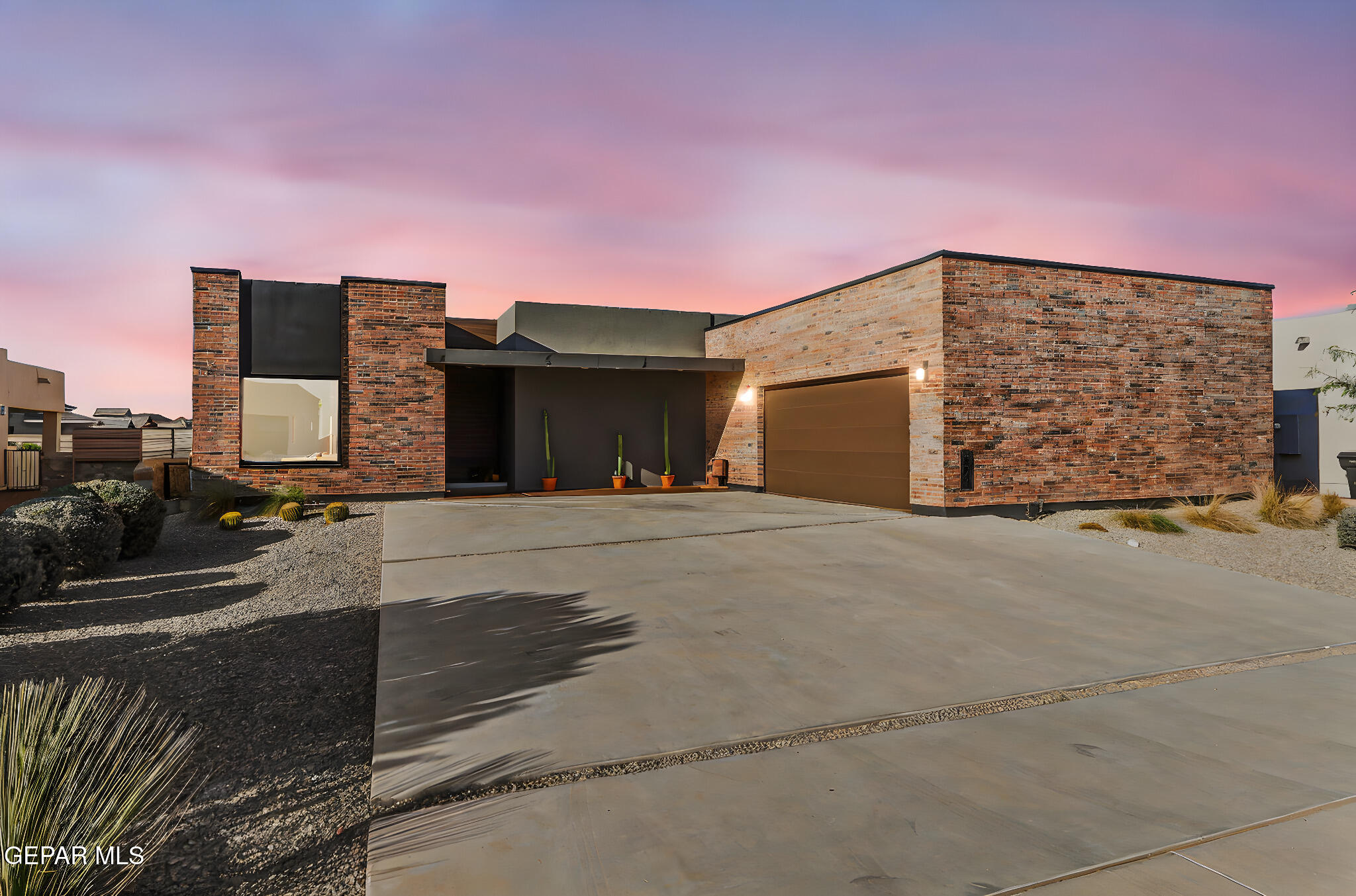 329 Rio Del Rancho Court El Paso, TX 79932 - Photo 3 of 52 a front view of a house with a garage