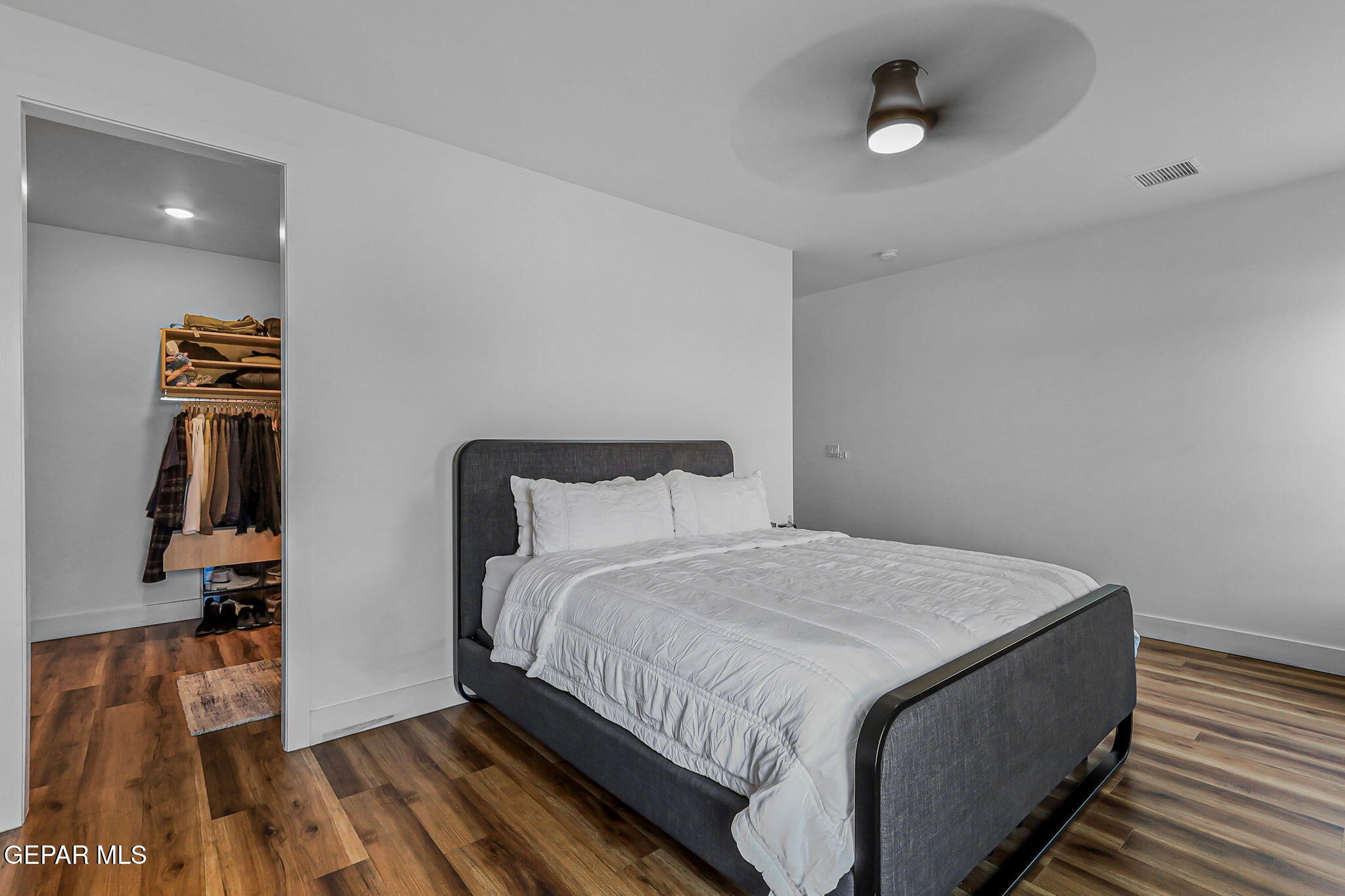 329 Rio Del Rancho Court El Paso, TX 79932 - Photo 32 of 52 a bedroom with a bed and walk in closet