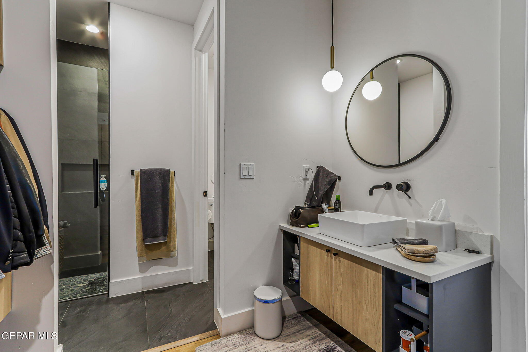 329 Rio Del Rancho Court El Paso, TX 79932 - Photo 34 of 52 a bathroom with a sink and a mirror