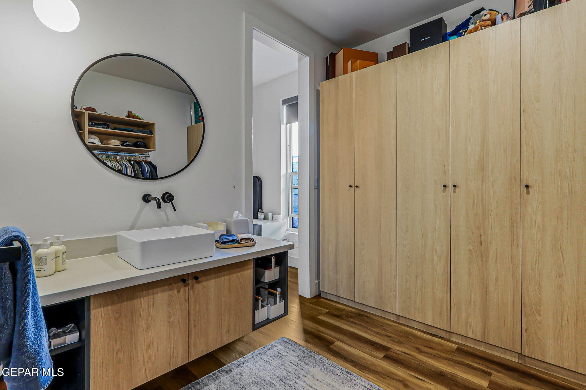 329 Rio Del Rancho Court El Paso, TX 79932 - Photo 39 of 52 a bathroom with a sink and a mirror