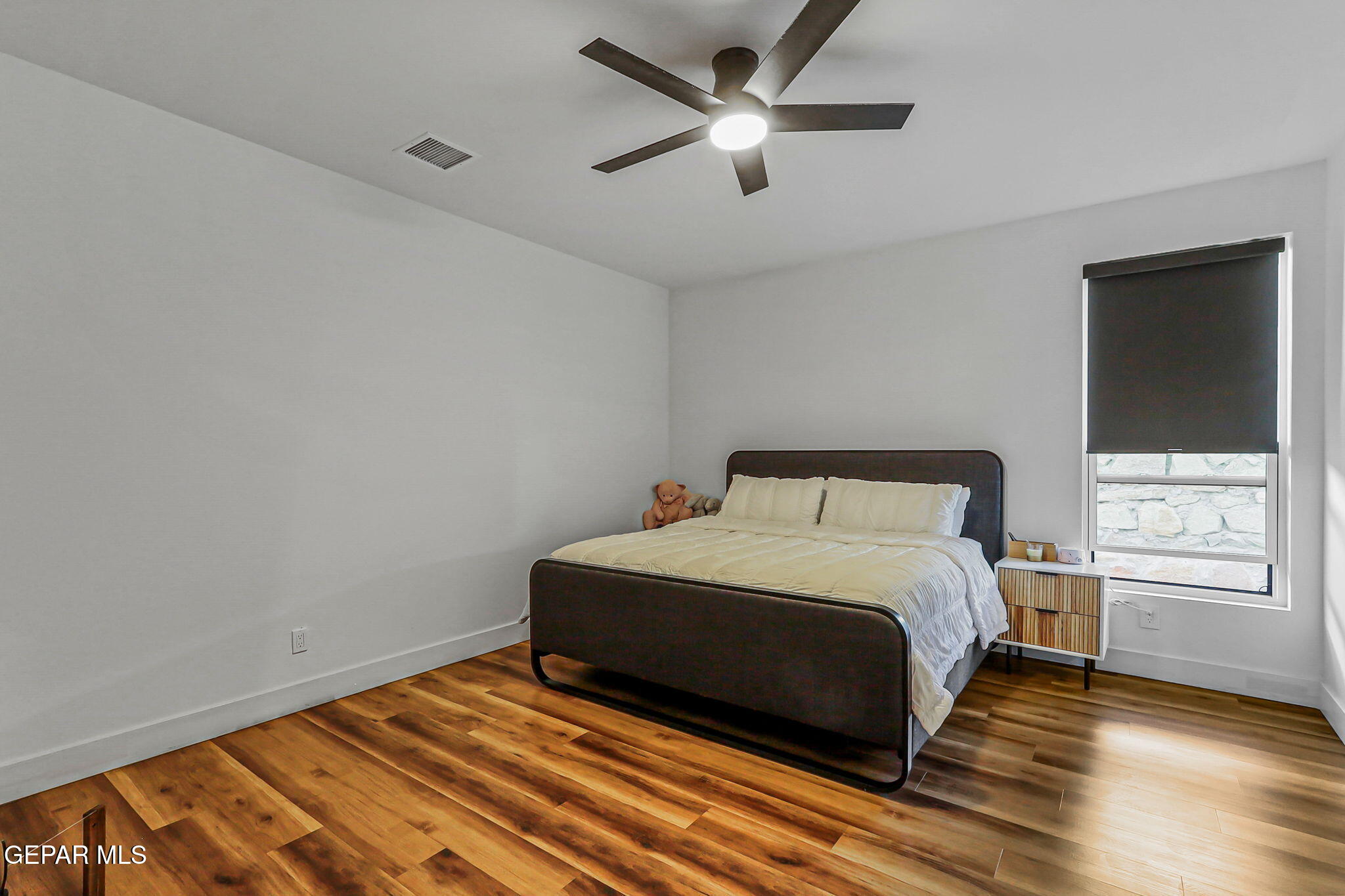 329 Rio Del Rancho Court El Paso, TX 79932 - Photo 41 of 52 a bedroom with a bed and a window