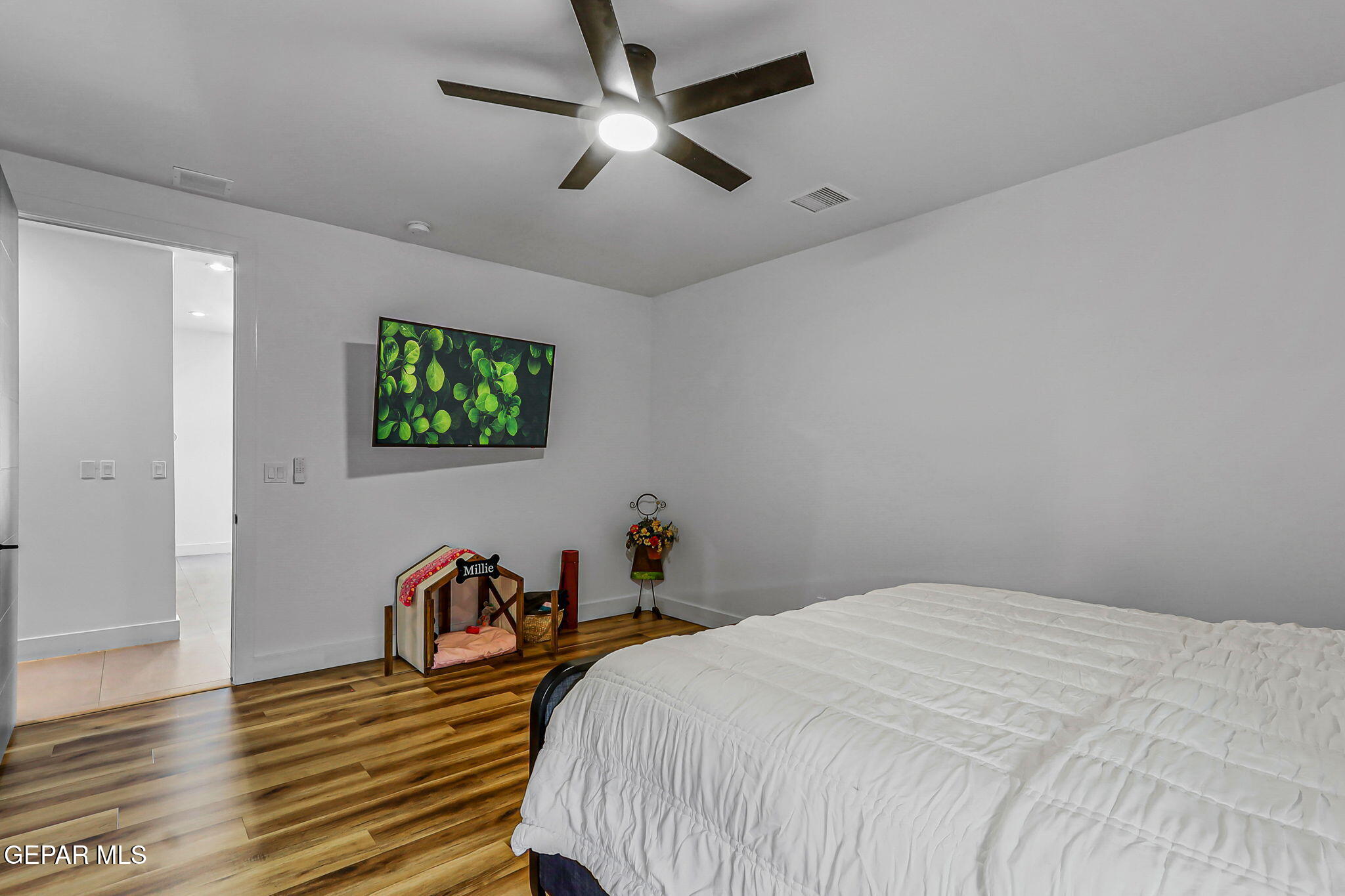 329 Rio Del Rancho Court El Paso, TX 79932 - Photo 43 of 52 a bed room with a bed and a chandelier