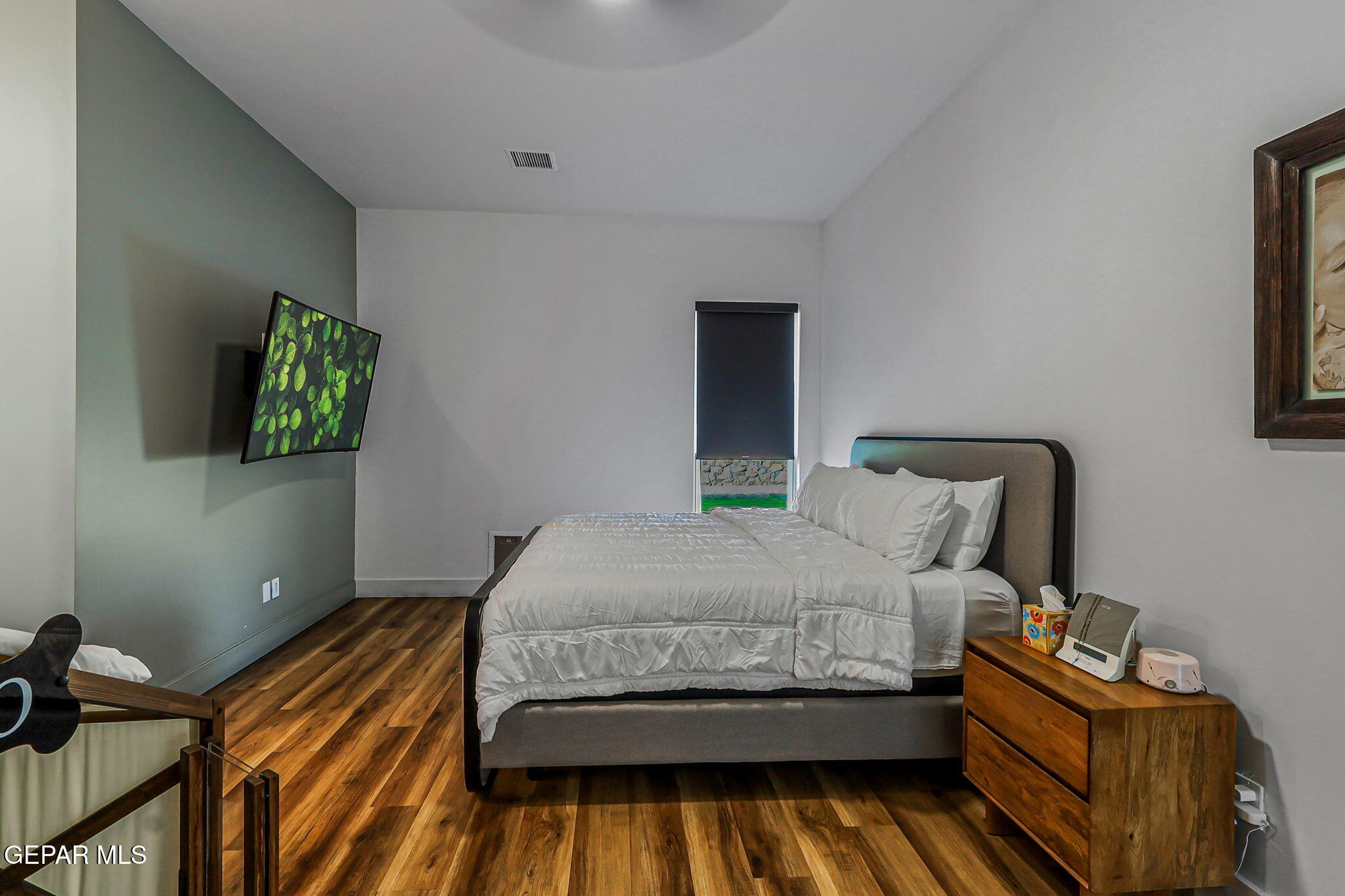 329 Rio Del Rancho Court El Paso, TX 79932 - Photo 44 of 52 a bedroom with a bed and a window