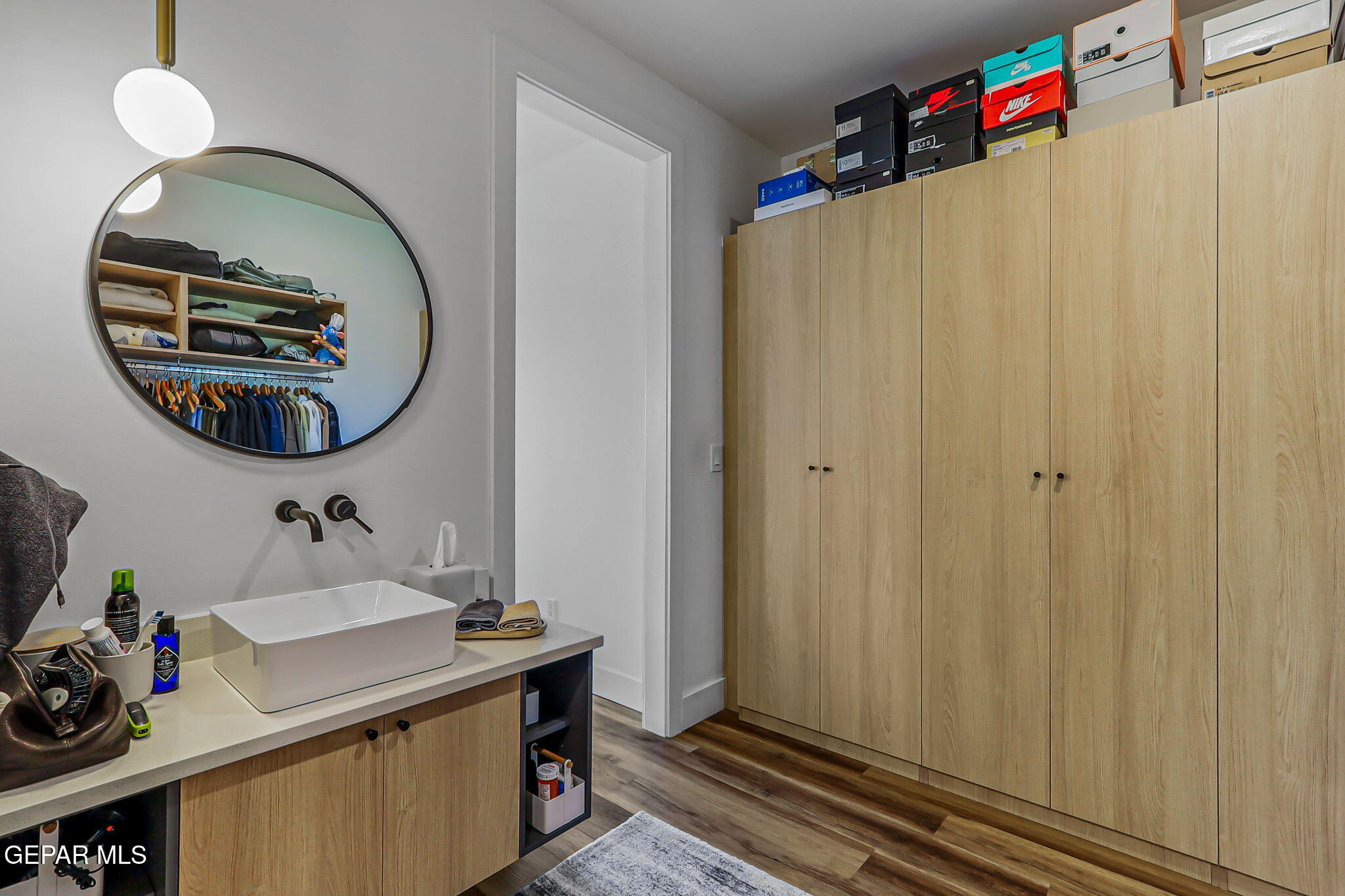 329 Rio Del Rancho Court El Paso, TX 79932 - Photo 45 of 52 a bathroom with a sink and a mirror