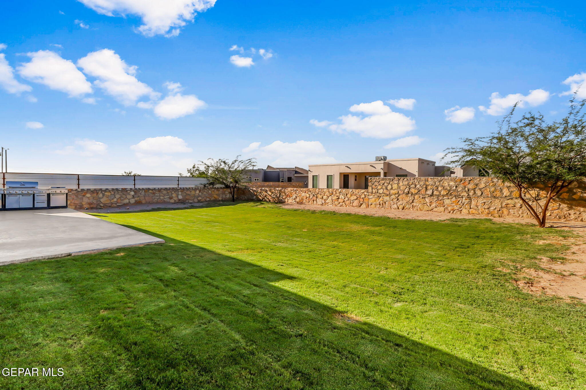 329 Rio Del Rancho Court El Paso, TX 79932 - Photo 50 of 52 a view of a house with a big yard