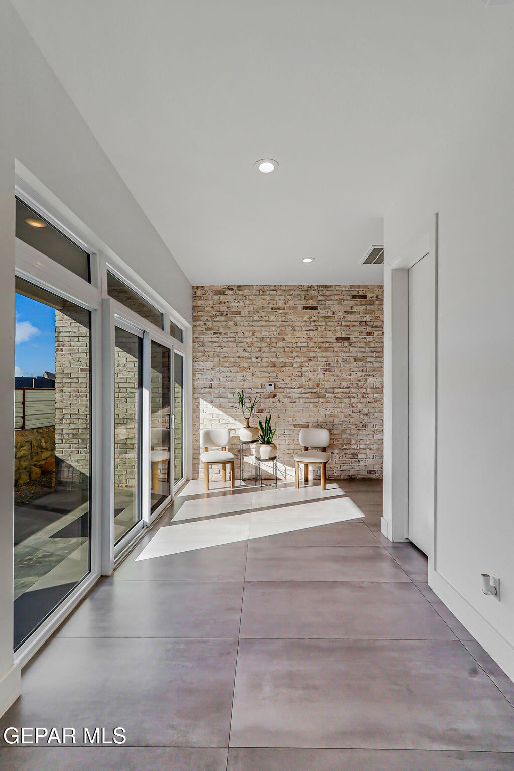 329 Rio Del Rancho Court El Paso, TX 79932 - Photo 7 of 52 a view of a livingroom with furniture and floor to ceiling window