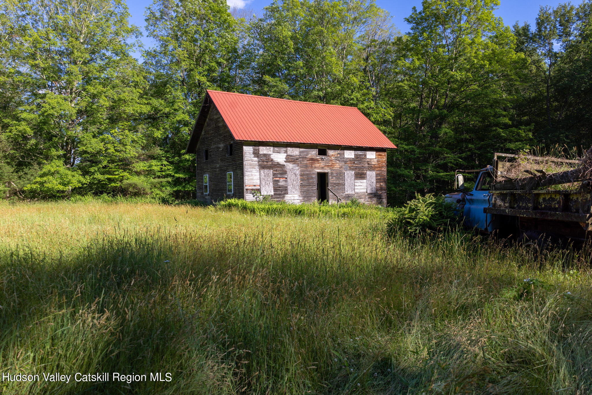 4049 Atwood Road, Unit END OF GERWIN ROAD Stone Ridge, NY 12484 - Photo 11 of 30 a view of a house with a yard