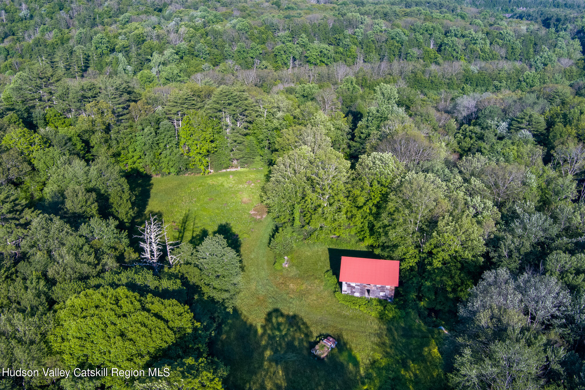 4049 Atwood Road, Unit END OF GERWIN ROAD Stone Ridge, NY 12484 - Photo 13 of 30 a sign that is sitting in a field with plants