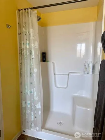 a living room with furniture fireplace and a flat screen tv