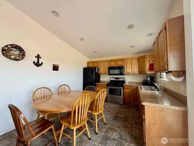 a view of a dining room with furniture