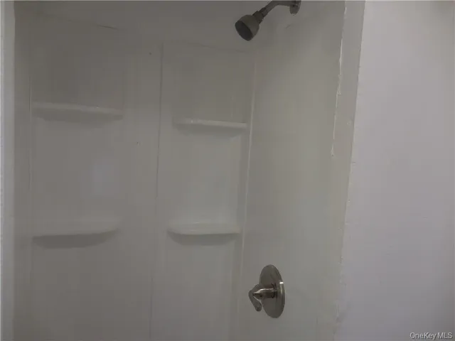 a close view of a shower in the bathroom
