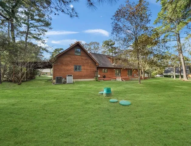 a front view of house with a garden and porch