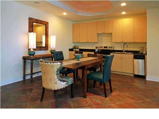 211 Durango Road, Unit 517 Destin, FL 32541 - Photo 24 of 28 a dinning table and chairs in a kitchen
