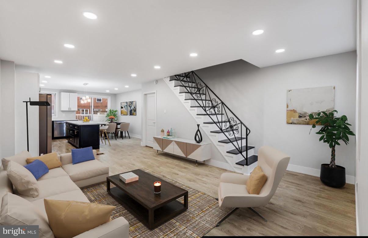 8546 Forrest Avenue Philadelphia, PA 19150 - Photo 20 of 56 a living room with furniture and a flat screen tv
