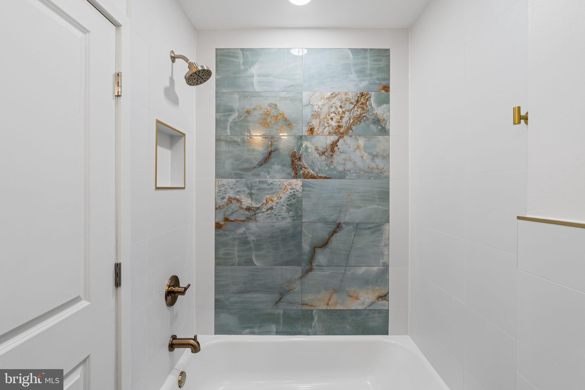 8546 Forrest Avenue Philadelphia, PA 19150 - Photo 28 of 56 a bathroom with a shower