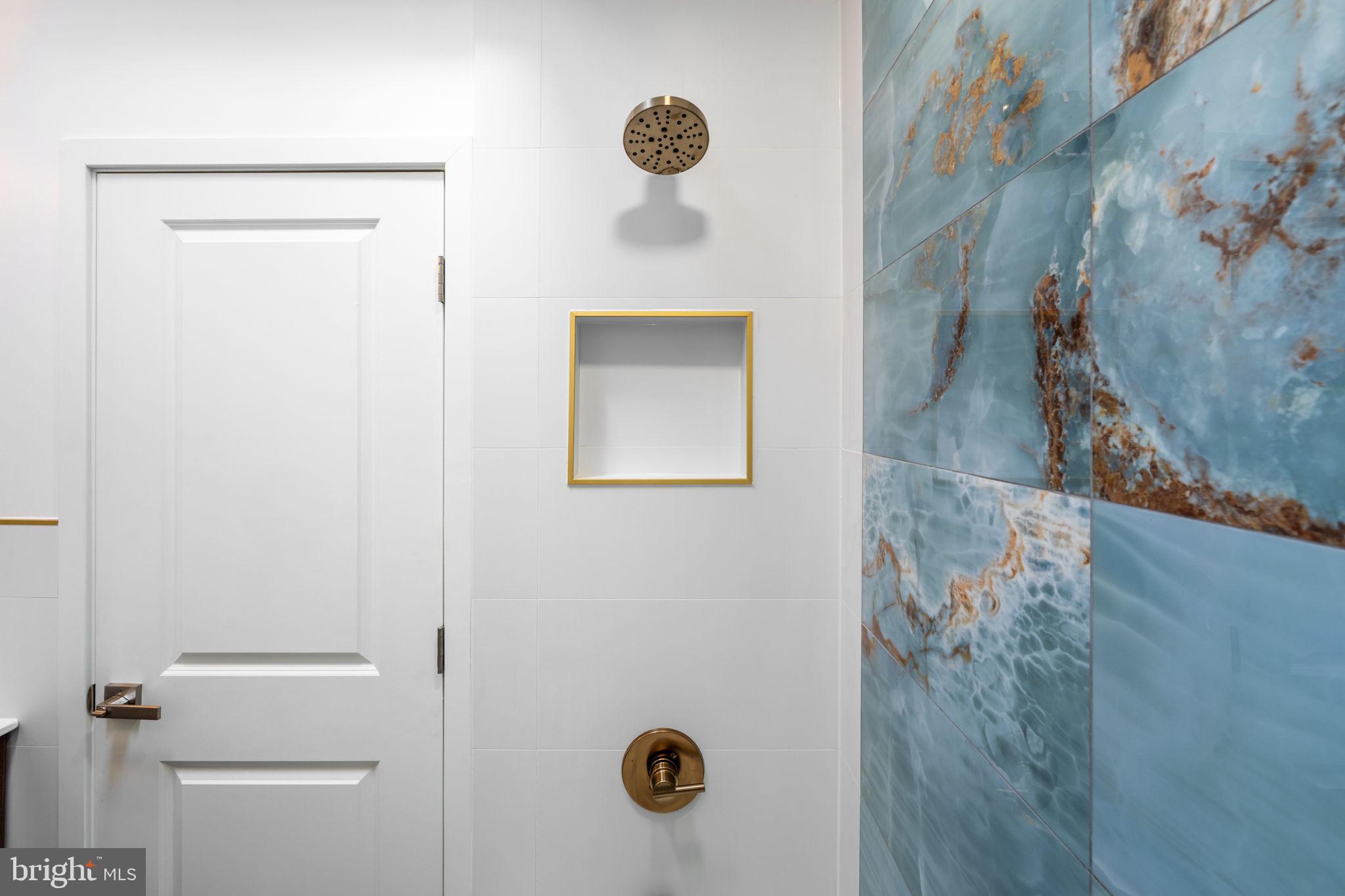 8546 Forrest Avenue Philadelphia, PA 19150 - Photo 30 of 56 a bathroom with a shower