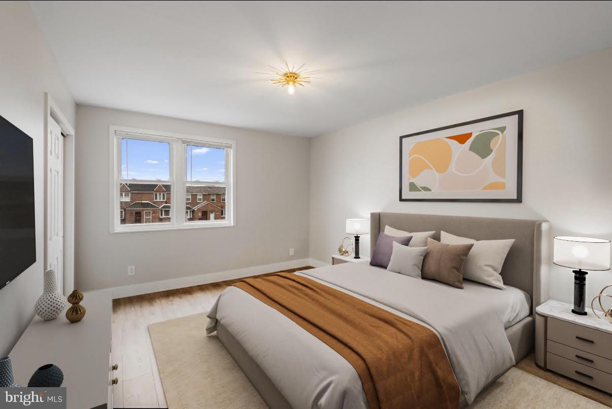 8546 Forrest Avenue Philadelphia, PA 19150 - Photo 34 of 56 a bedroom with a bed and a window