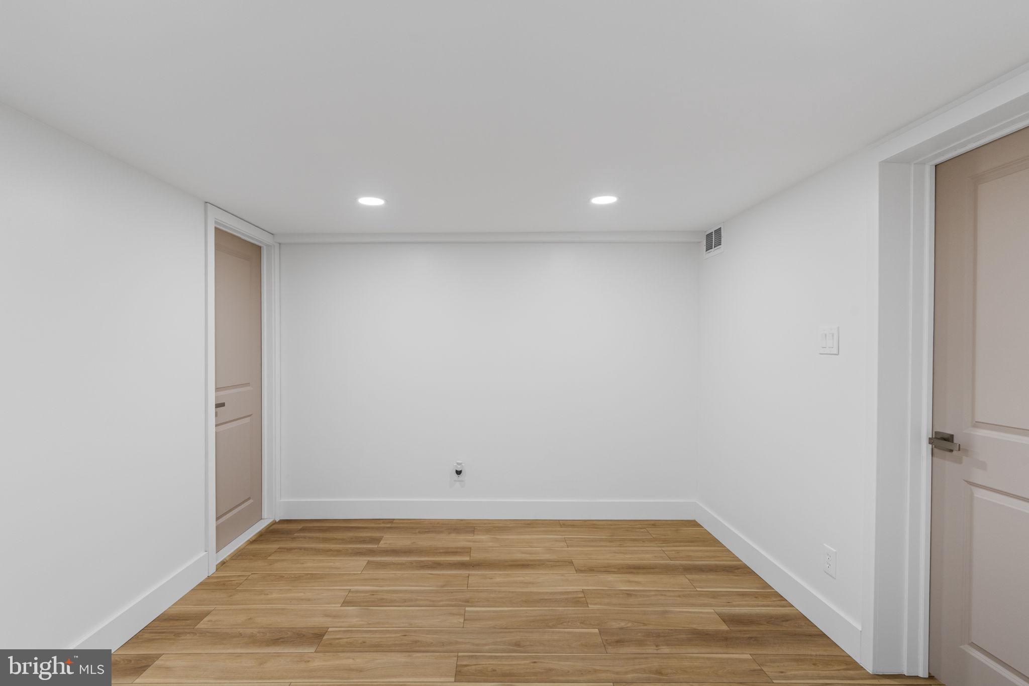 8546 Forrest Avenue Philadelphia, PA 19150 - Photo 41 of 56 a view of room with wooden floor
