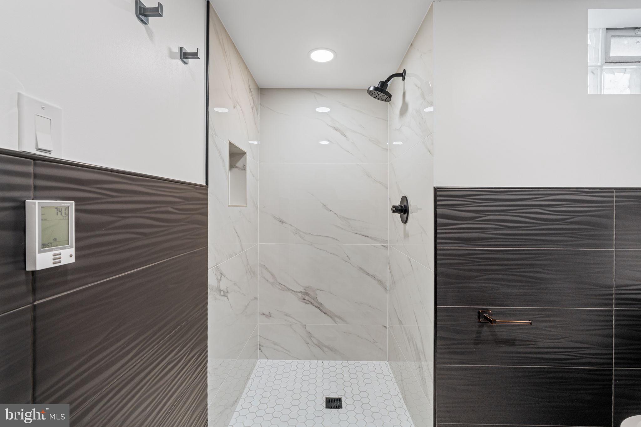 8546 Forrest Avenue Philadelphia, PA 19150 - Photo 46 of 56 a bathroom with a shower and a shower