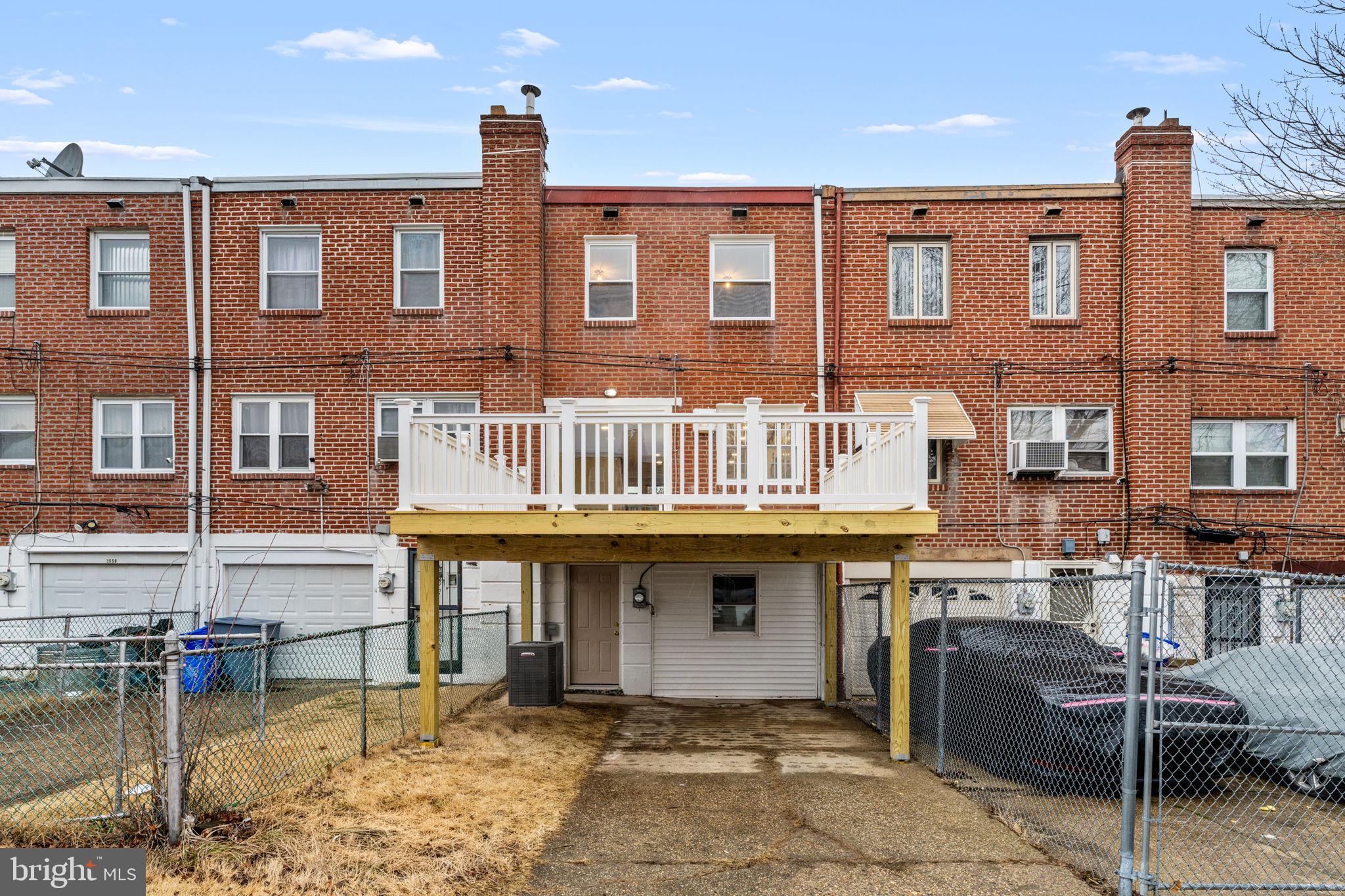 8546 Forrest Avenue Philadelphia, PA 19150 - Photo 55 of 56 a front view of a building with parking space