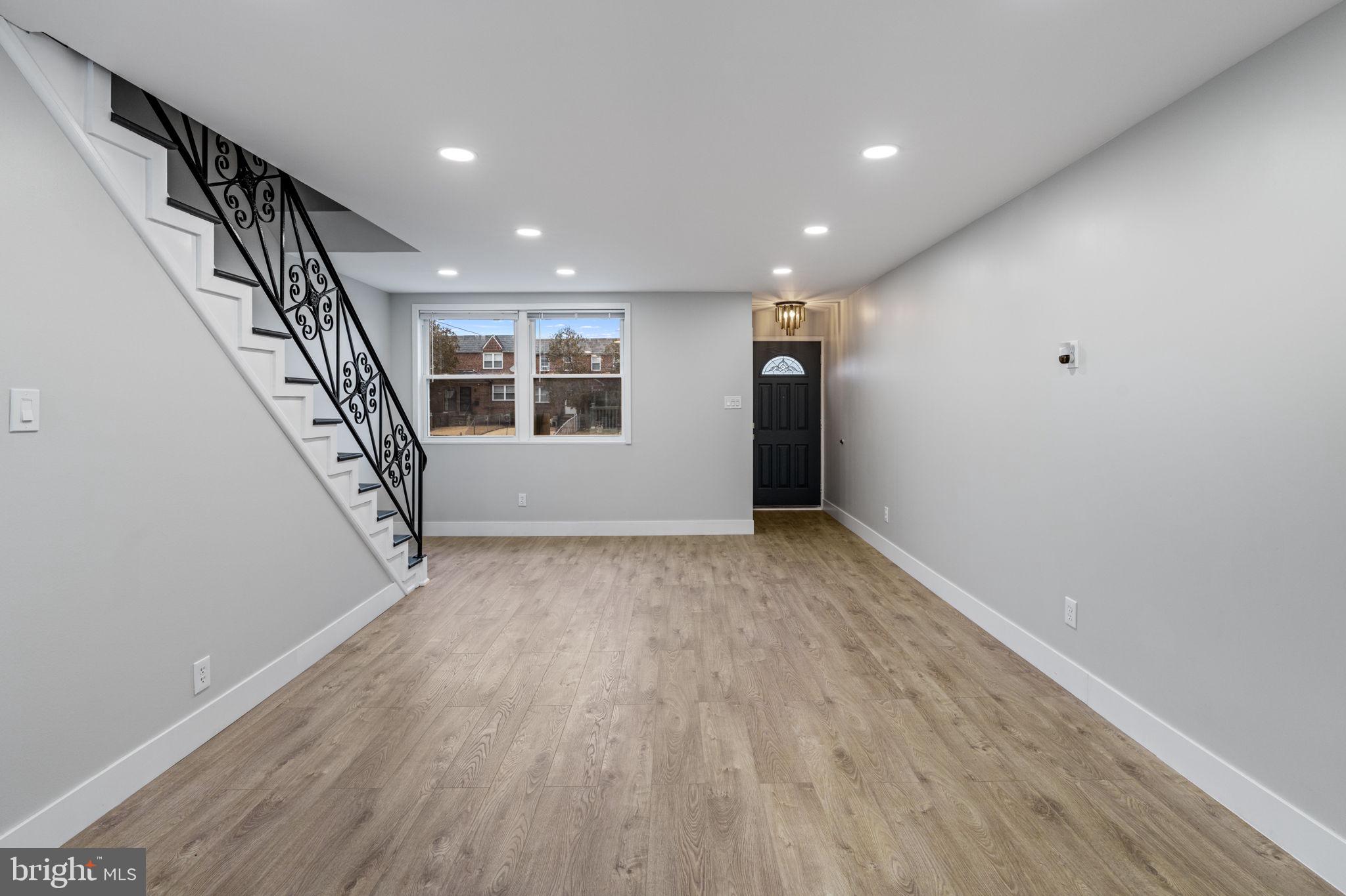8546 Forrest Avenue Philadelphia, PA 19150 - Photo 10 of 56 a view of entryway with stairs and wooden floor