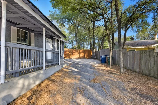 a view of a house with a snow on the road