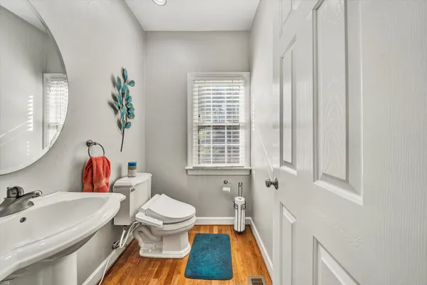 a bathroom with a sink a toilet and a bathtub