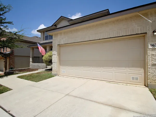 a view of a house with a street