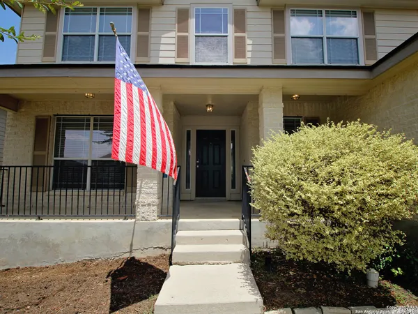 a front view of a house with a garage