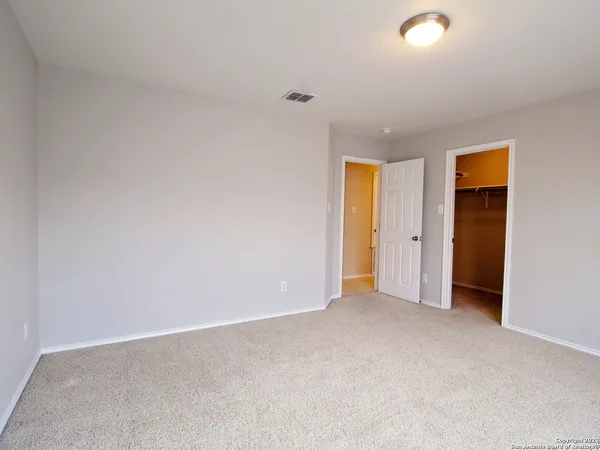 an empty room with an entryway