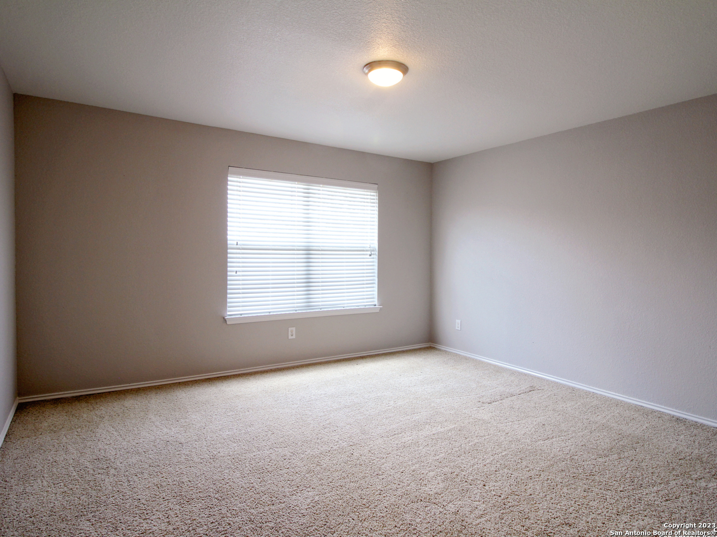 9627 Mediator Run Converse, TX 78109 - Photo 32 of 41 an empty room with a window