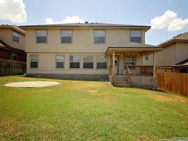 a view of a house with a swimming pool