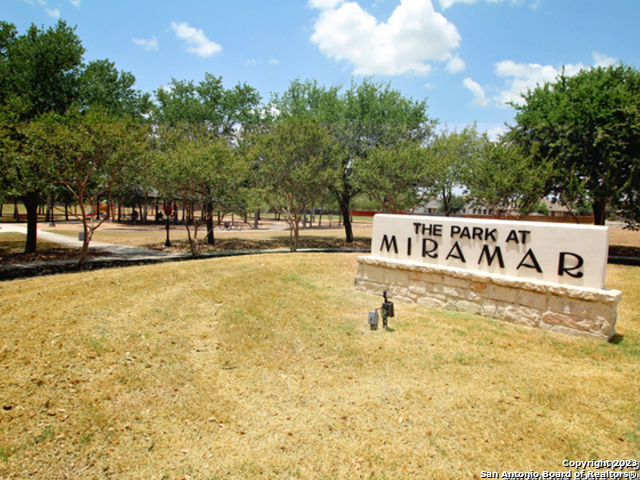 9627 Mediator Run Converse, TX 78109 - Photo 40 of 41 a view of swimming pool with outdoor seating and covered with trees