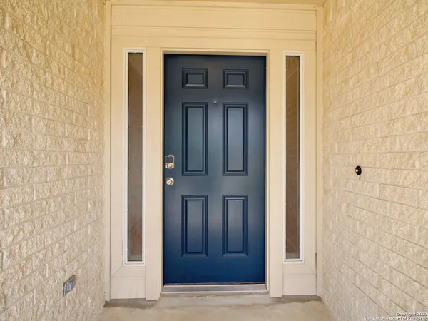wooden door with glass door