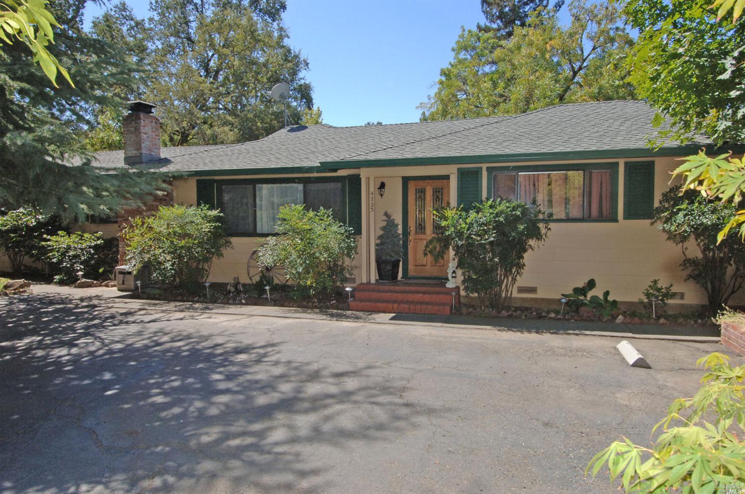 4723 Wikiup Bridge Way Santa Rosa, CA 95403 - Photo 1 of 1 a front view of a house with garden