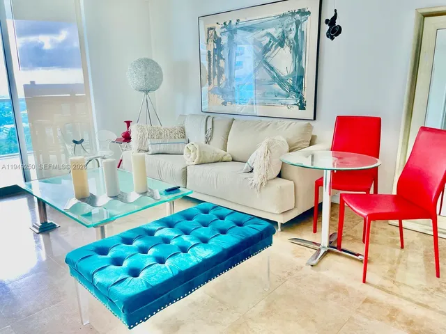 a kitchen with a stove microwave and sink