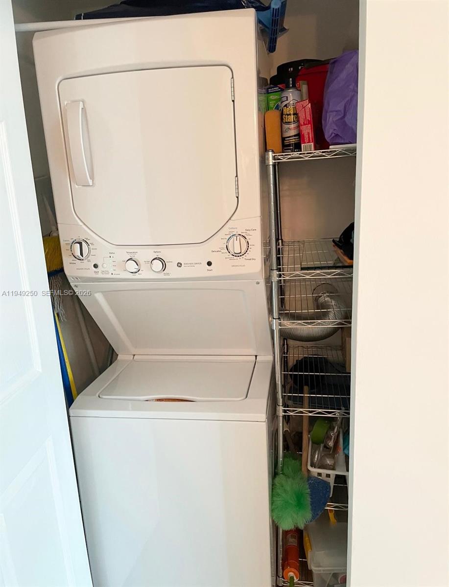 2101 Brickell Avenue, Unit 2110 Miami, FL 33129 - Photo 4 of 15 a utility room with dryer and washer