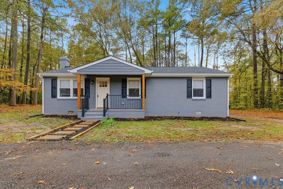a front view of a house with yard