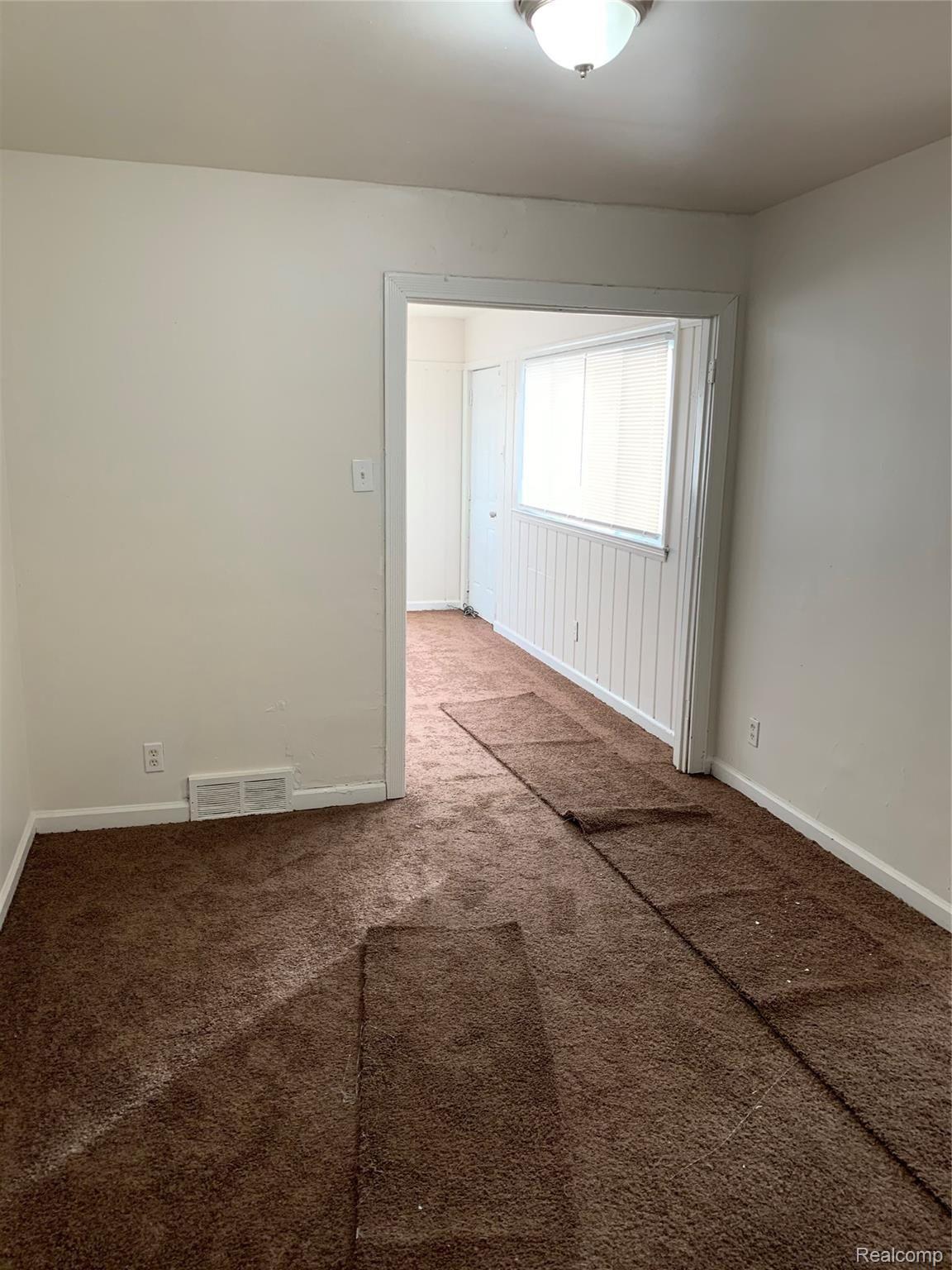 10910 Nottingham Road Detroit, MI 48224 - Photo 11 of 35 Could be 3rd bedroom or dining room. Leads to back "great room"