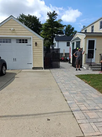 a front view of house with yard