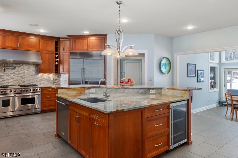 2 Cobblefield Road Mendham, NJ 07945 - Photo 10 of 50 a kitchen with a stove a sink and a refrigerator