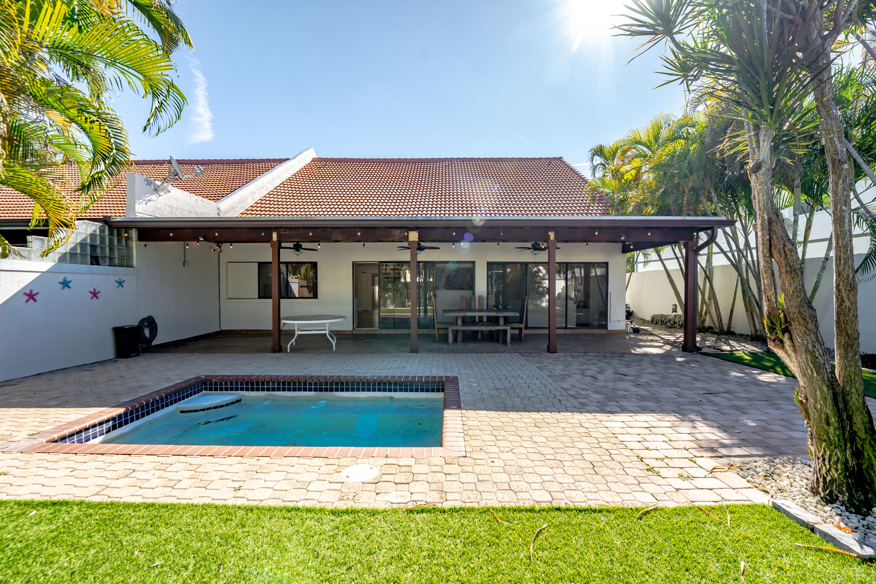 a view of a house with swimming pool