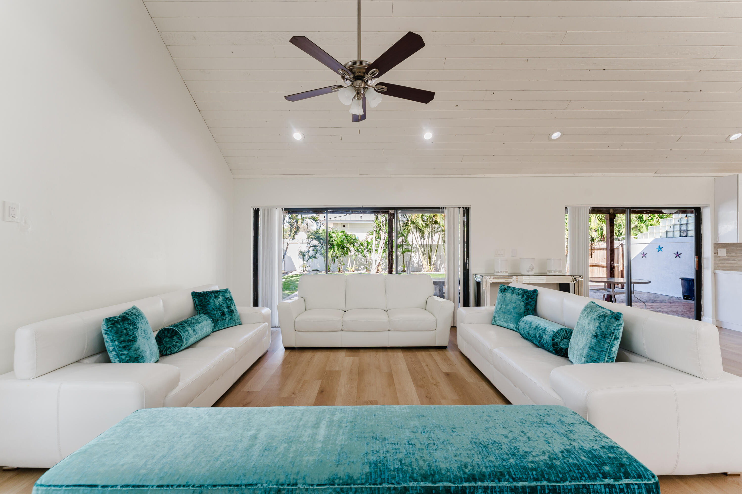 665 Jeffery Street Boca Raton, FL 33487 - Photo 14 of 44 a living room with furniture and a large window